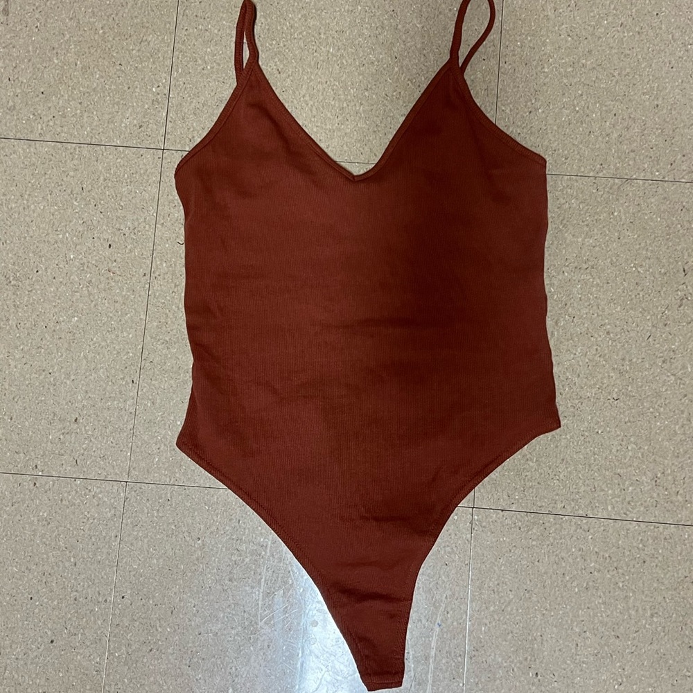 BP brick red body suit